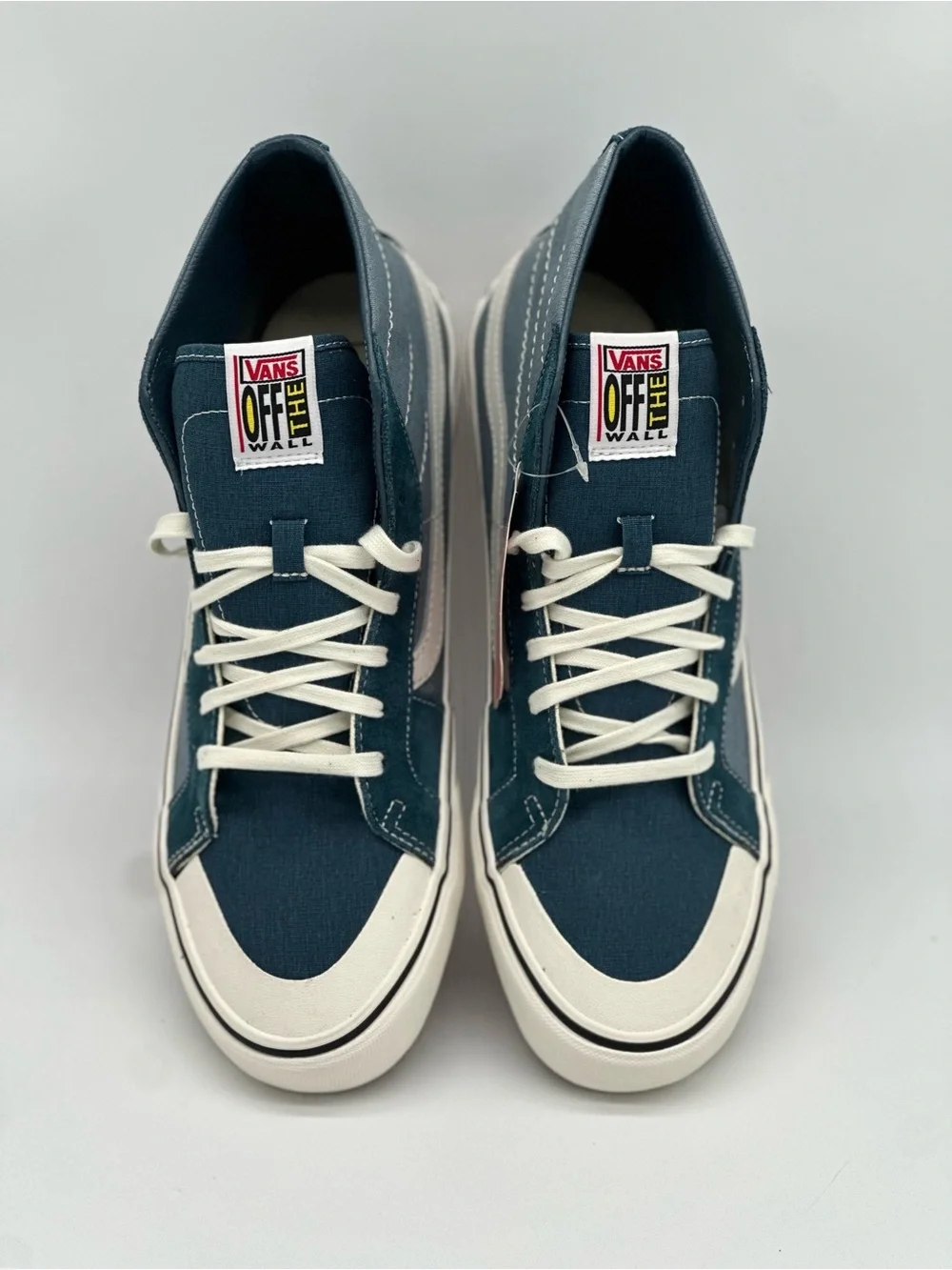 Vans Mid-Top Sneakers in Teal and White with Checkerboard Sole